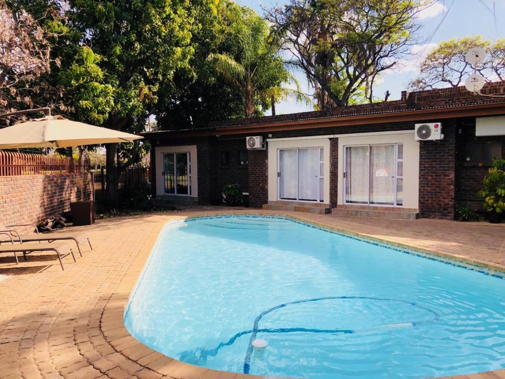 Bosveld Guest House Onverwacht ภายนอก รูปภาพ