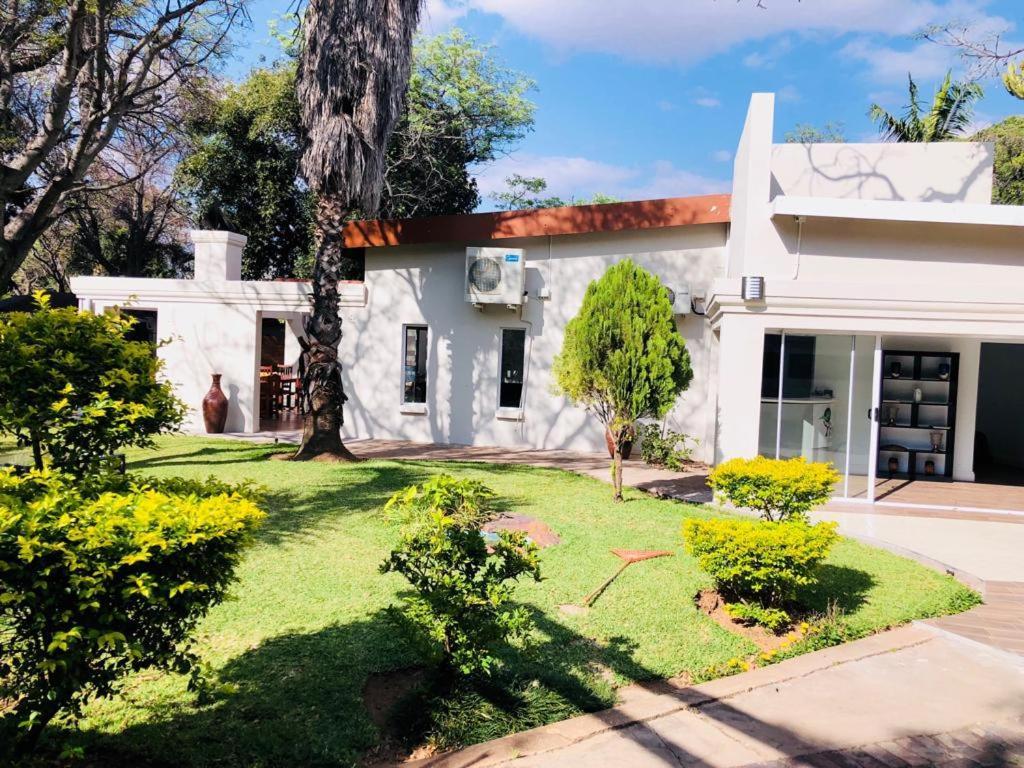 Bosveld Guest House Onverwacht ภายนอก รูปภาพ